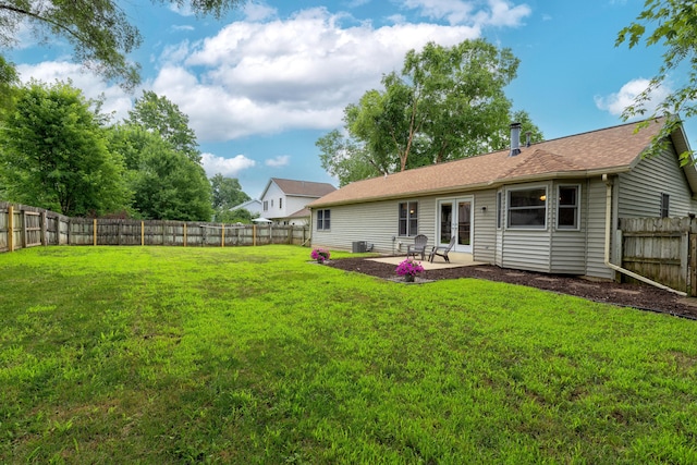 1428 Sherry Dr, Portage, MI 49024 - rear view of property with a patio, a fenced backyard, and french doors