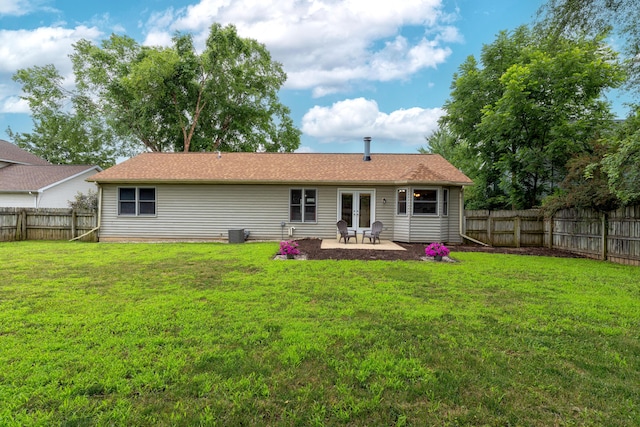 1428 Sherry Dr, Portage, MI 49024 - rear view of house with a fenced backyard and a patio area