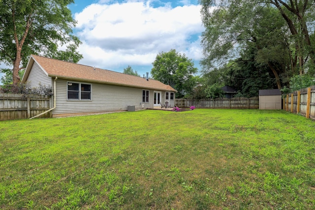 1428 Sherry Dr, Portage, MI 49024 - fenced backyard featuring a storage shed and a patio area