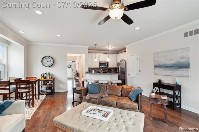 42384 Gateway Dr, Plymouth, MI 48170 - living area with a ceiling fan, recessed lighting, dark wood-style flooring, and crown molding