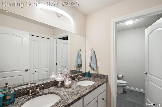 42384 Gateway Dr, Plymouth, MI 48170 - bathroom featuring double vanity and tile patterned flooring