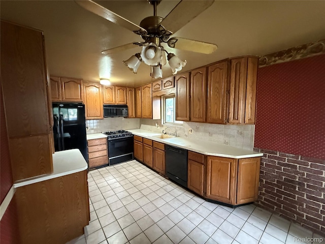 16061 Common Rd, Roseville, MI 48066 - kitchen featuring black appliances, brown cabinetry, a ceiling fan, light tile patterned floors, and wallpapered walls