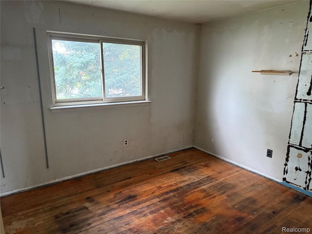 16061 Common Rd, Roseville, MI 48066 - empty room with hardwood / wood-style flooring