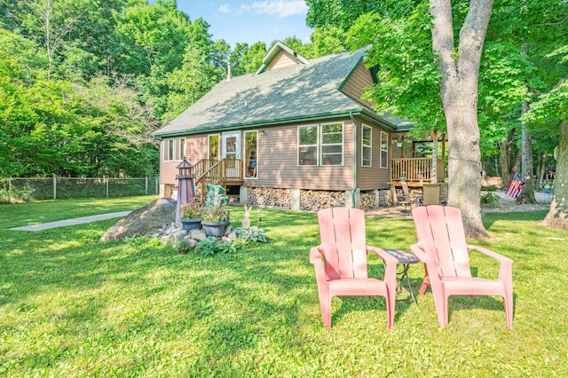 76 Meceola Ct, Hersey, MI 49639 - view of front facade with a deck, roof with shingles, and stairway