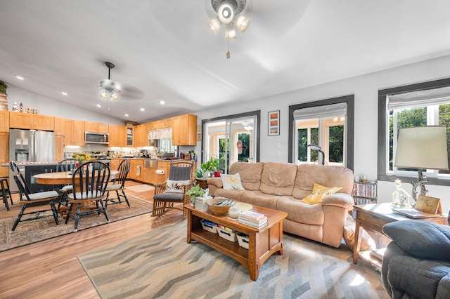 76 Meceola Ct, Hersey, MI 49639 - living room featuring ceiling fan, vaulted ceiling, light wood-style floors, and recessed lighting