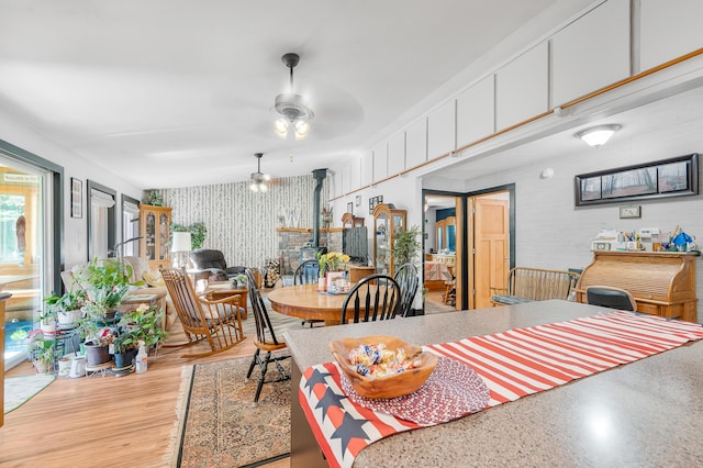 76 Meceola Ct, Hersey, MI 49639 - dining room featuring wallpapered walls and ceiling fan