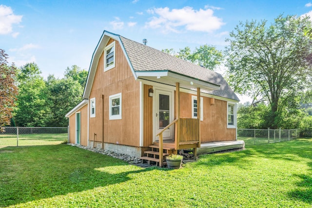 76 Meceola Ct, Hersey, MI 49639 - back of house featuring a fenced backyard, a shingled roof, and view of scattered trees