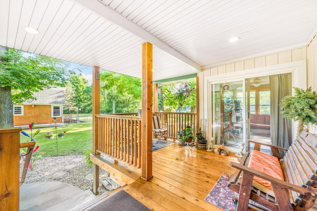 76 Meceola Ct, Hersey, MI 49639 - wooden terrace featuring a yard