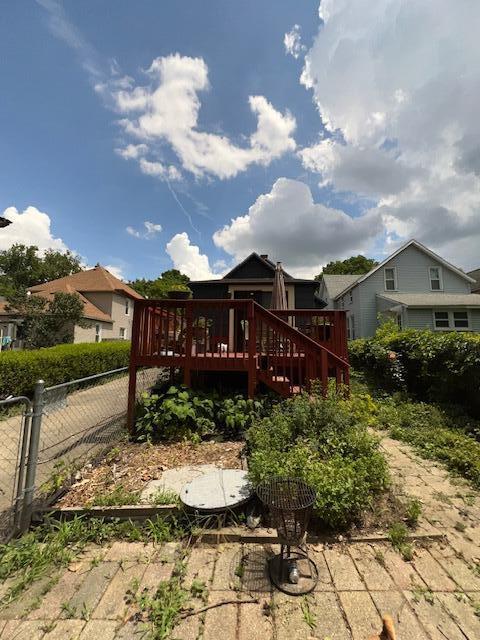 1325 Maude Ave NE, Grand Rapids, MI 49505 - back of house with a wooden deck