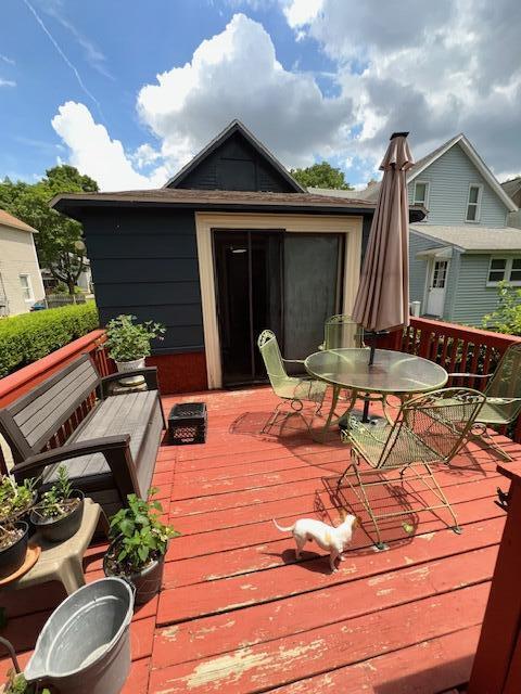 1325 Maude Ave NE, Grand Rapids, MI 49505 - wooden terrace featuring outdoor dining space