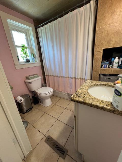 1325 Maude Ave NE, Grand Rapids, MI 49505 - full bath with vanity, tile patterned flooring, and curtained shower