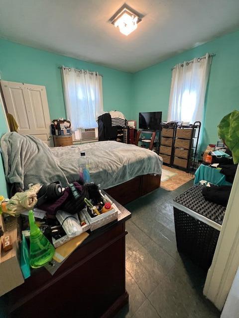 1325 Maude Ave NE, Grand Rapids, MI 49505 - bedroom with multiple windows and cooling unit