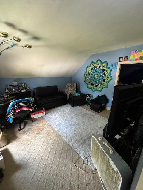 1325 Maude Ave NE, Grand Rapids, MI 49505 - interior space featuring vaulted ceiling, an office area, and carpet floors
