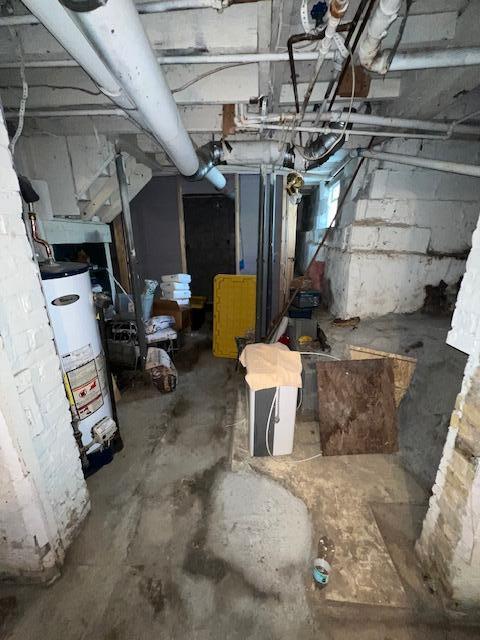 1325 Maude Ave NE, Grand Rapids, MI 49505 - unfinished basement with water heater