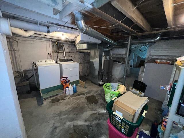 1325 Maude Ave NE, Grand Rapids, MI 49505 - unfinished basement featuring washer and dryer