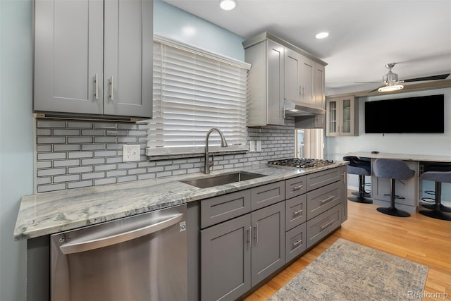 1024 London Ave, Lincoln Park, MI 48146 - kitchen with appliances with stainless steel finishes, gray cabinetry, under cabinet range hood, a ceiling fan, and recessed lighting