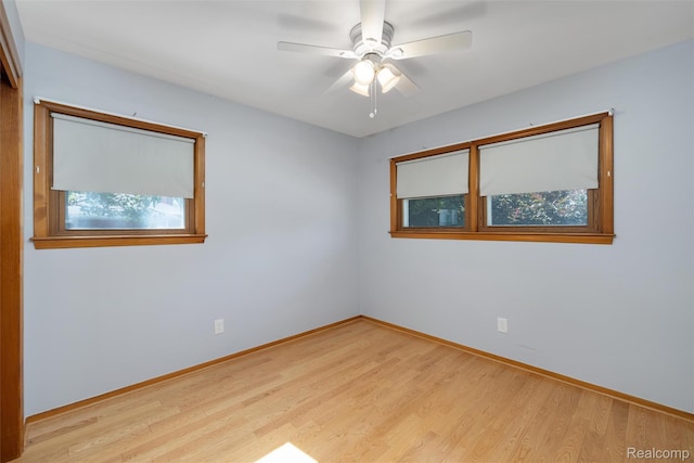 1024 London Ave, Lincoln Park, MI 48146 - spare room with light wood-type flooring and a ceiling fan