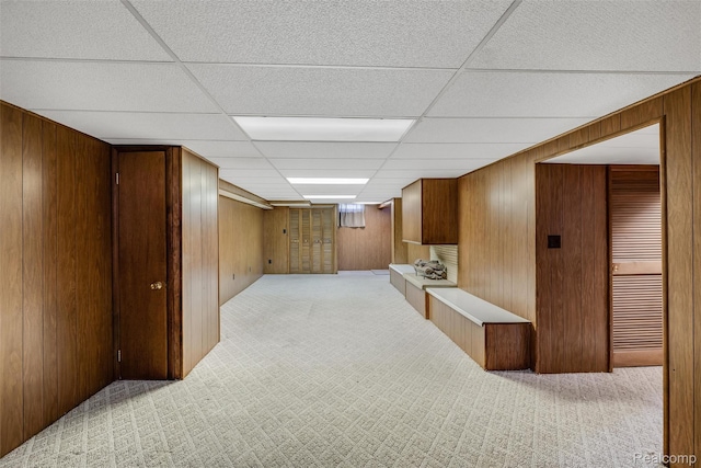 1024 London Ave, Lincoln Park, MI 48146 - finished below grade area with light colored carpet, wooden walls, and a paneled ceiling
