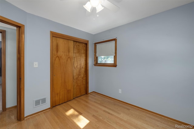 1024 London Ave, Lincoln Park, MI 48146 - unfurnished bedroom featuring light wood-type flooring, a closet, and a ceiling fan
