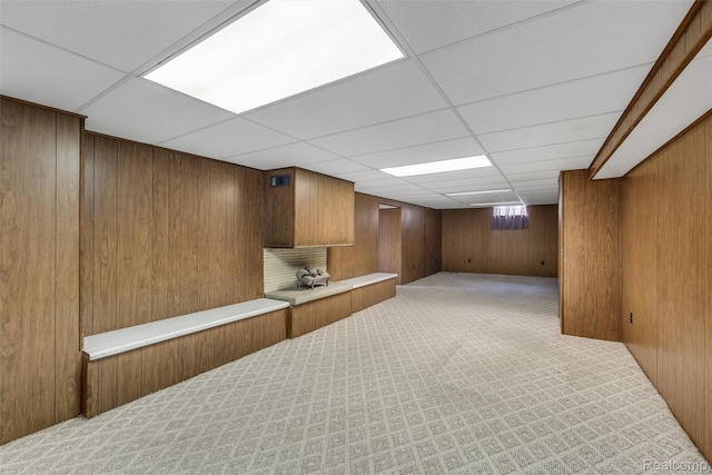 1024 London Ave, Lincoln Park, MI 48146 - finished below grade area with carpet, wooden walls, and a drop ceiling