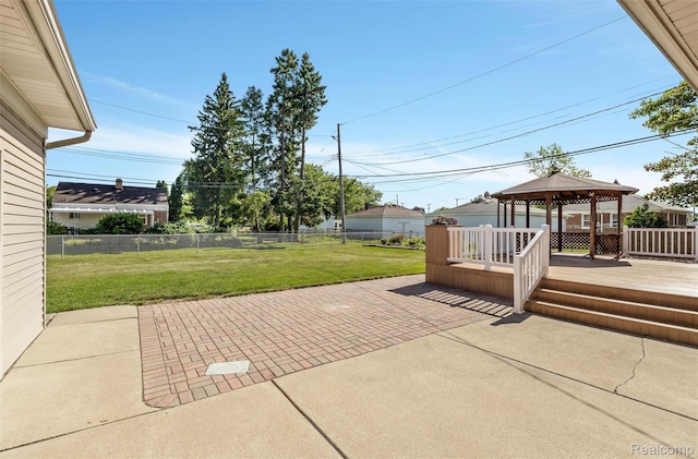 1024 London Ave, Lincoln Park, MI 48146 - fenced backyard with a gazebo, a patio area, and a deck