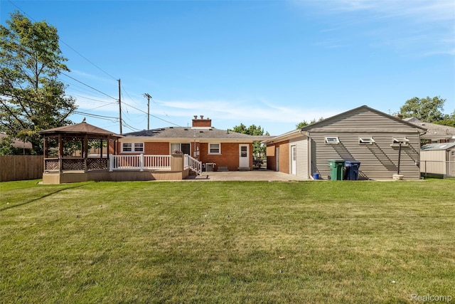 1024 London Ave, Lincoln Park, MI 48146 - back of house with a gazebo, brick siding, a patio, a chimney, and a deck
