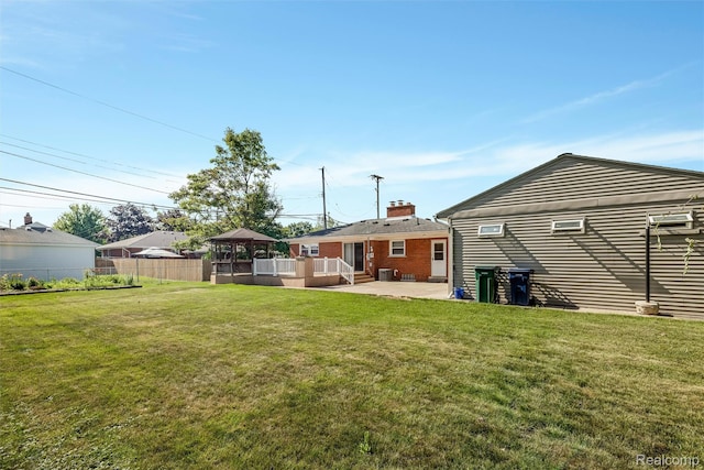 1024 London Ave, Lincoln Park, MI 48146 - back of house featuring a gazebo, a chimney, and a patio