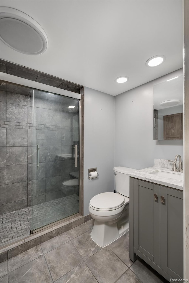 1024 London Ave, Lincoln Park, MI 48146 - full bathroom with vanity, a stall shower, and tile patterned flooring