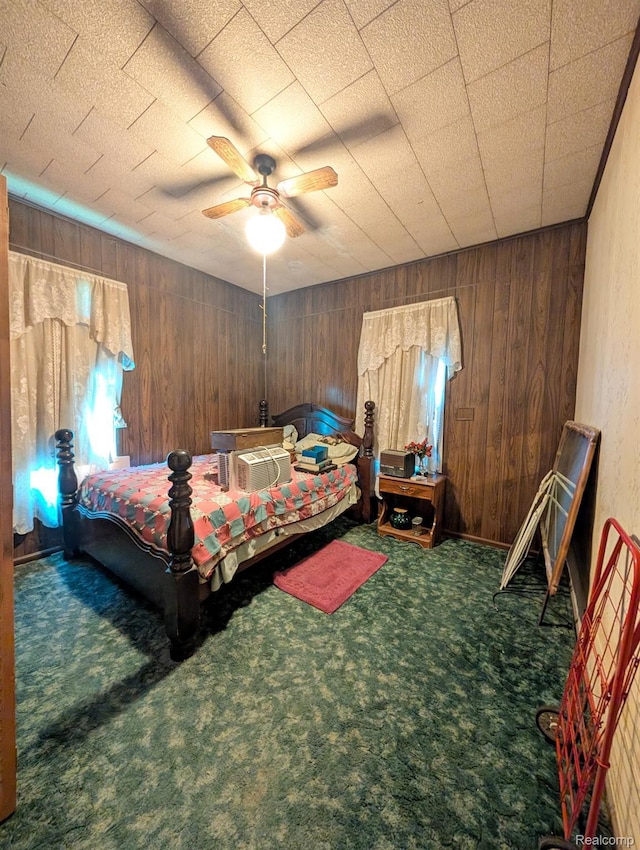 1402 Allen St, Burton, MI 48529 - carpeted bedroom featuring wood walls and a ceiling fan