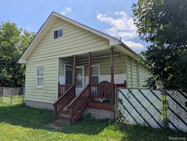 1402 Allen St, Burton, MI 48529 - view of front of house with covered porch