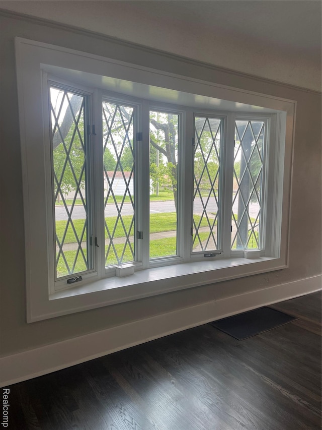 160 Emmons Blvd, Wyandotte, MI 48192 - detailed view of baseboards and wood finished floors