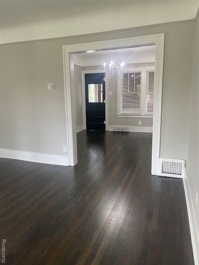 160 Emmons Blvd, Wyandotte, MI 48192 - entrance foyer with a chandelier and dark wood-style floors