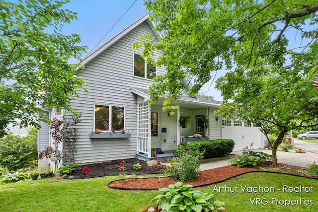 331 Conkey Dr, Michigan, MI 48834 - view of front of property featuring a porch, driveway, and a front lawn