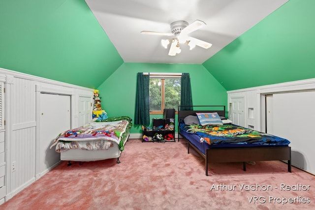 331 Conkey Dr, Michigan, MI 48834 - carpeted bedroom with lofted ceiling, ceiling fan, and multiple closets