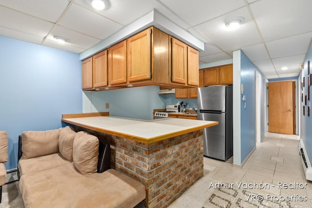 331 Conkey Dr, Michigan, MI 48834 - kitchen featuring freestanding refrigerator, white gas range oven, a drop ceiling, light tile patterned flooring, and under cabinet range hood