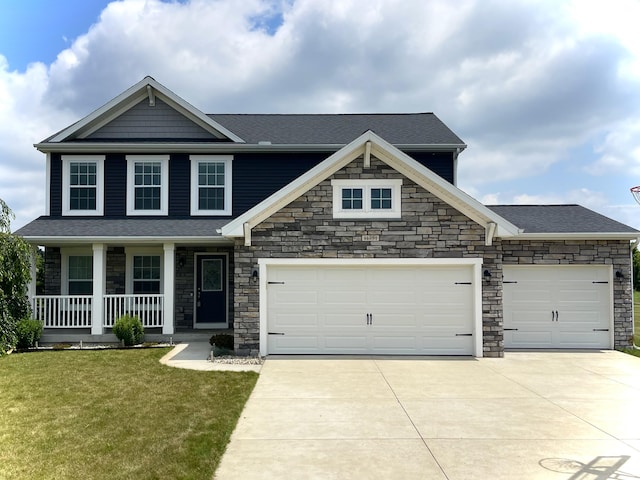 11751 Prairie Edge St, Schoolcraft, MI 49087 - craftsman inspired home featuring stone siding, concrete driveway, a front yard, a porch, and an attached garage