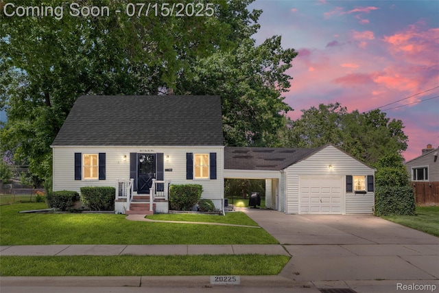 20225 Shady Lane Ave, Saint Clair Shores, MI 48080 - cape cod-style house with driveway, an attached carport, roof with shingles, and an attached garage