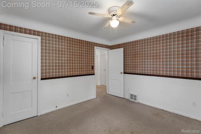 20225 Shady Lane Ave, Saint Clair Shores, MI 48080 - empty room with wallpapered walls, ceiling fan, and carpet floors