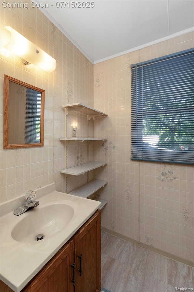 20225 Shady Lane Ave, Saint Clair Shores, MI 48080 - bathroom with tile walls, vanity, and ornamental molding