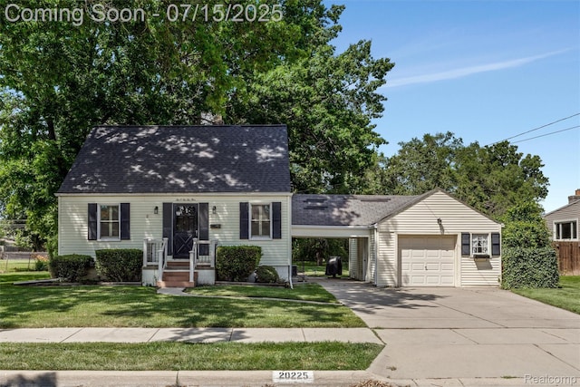 20225 Shady Lane Ave, Saint Clair Shores, MI 48080 - cape cod house featuring concrete driveway, a carport, a shingled roof, and a garage