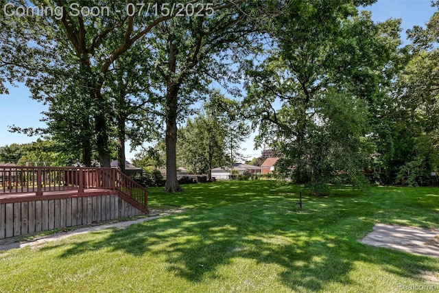 20225 Shady Lane Ave, Saint Clair Shores, MI 48080 - view of green lawn with a wooden deck