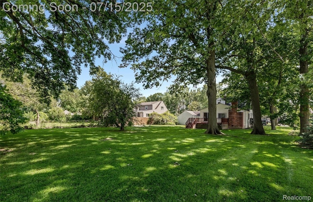 20225 Shady Lane Ave, Saint Clair Shores, MI 48080 - view of green lawn featuring a wooden deck