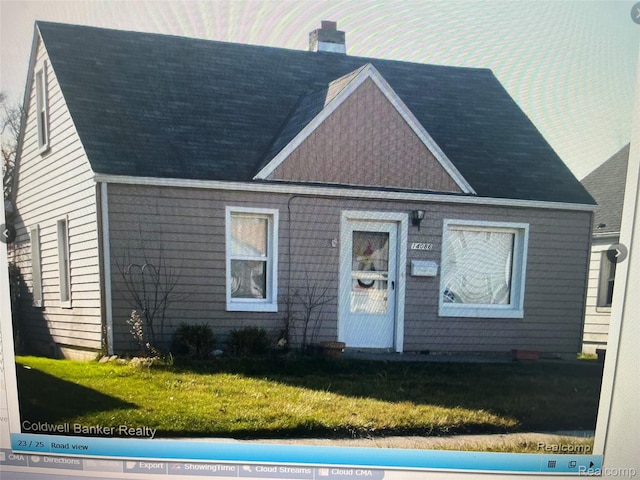 14086 Hendricks Ave, Warren, MI 48089 - view of front of property featuring a front lawn and a chimney
