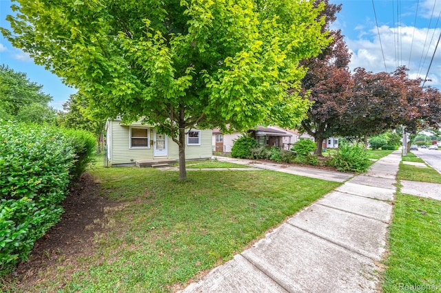 18379 Hazelwood St, Roseville, MI 48066 - obstructed view of property featuring a front yard