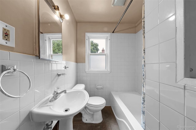 18379 Hazelwood St, Roseville, MI 48066 - full bath featuring tile walls, tile patterned floors, shower / tub combo with curtain, and a wainscoted wall