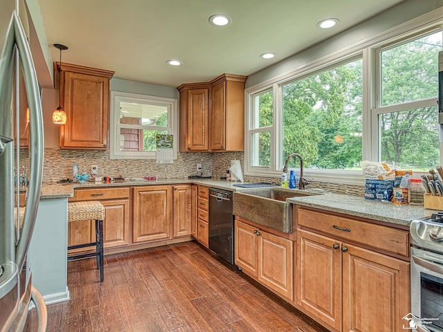 5825 Edgewood Blvd, Monroe, MI 48161 - kitchen with stainless steel appliances, dark wood-style flooring, healthy amount of natural light, decorative backsplash, and recessed lighting