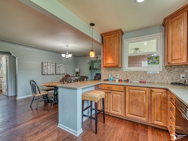 5825 Edgewood Blvd, Monroe, MI 48161 - kitchen featuring dishwasher, a kitchen bar, tasteful backsplash, a peninsula, and recessed lighting