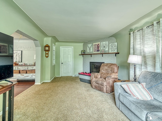 5825 Edgewood Blvd, Monroe, MI 48161 - carpeted living room with a fireplace