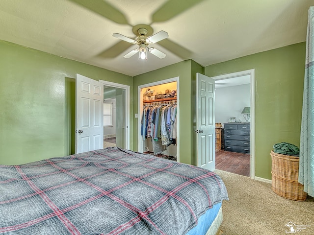 5825 Edgewood Blvd, Monroe, MI 48161 - bedroom with carpet flooring, ceiling fan, a walk in closet, and a closet