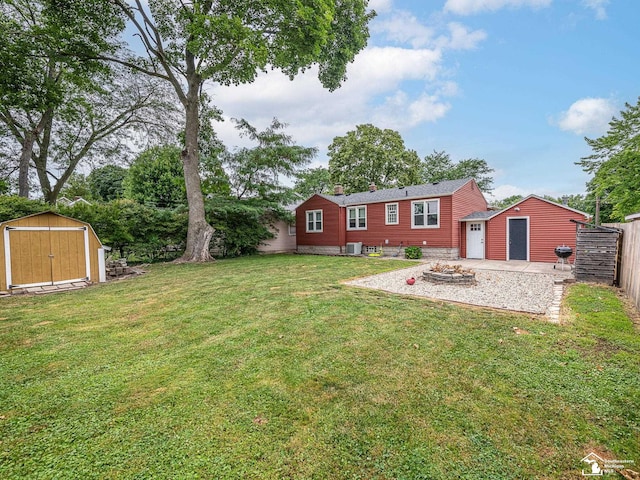 5825 Edgewood Blvd, Monroe, MI 48161 - view of yard with a shed and an outdoor fire pit